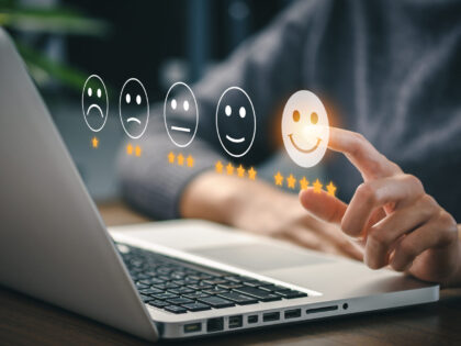 User give rating to service experience on online application for Customer review satisfaction feedback survey concept.